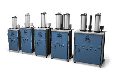 Five blue balers designed for recycling and making money of cardboard